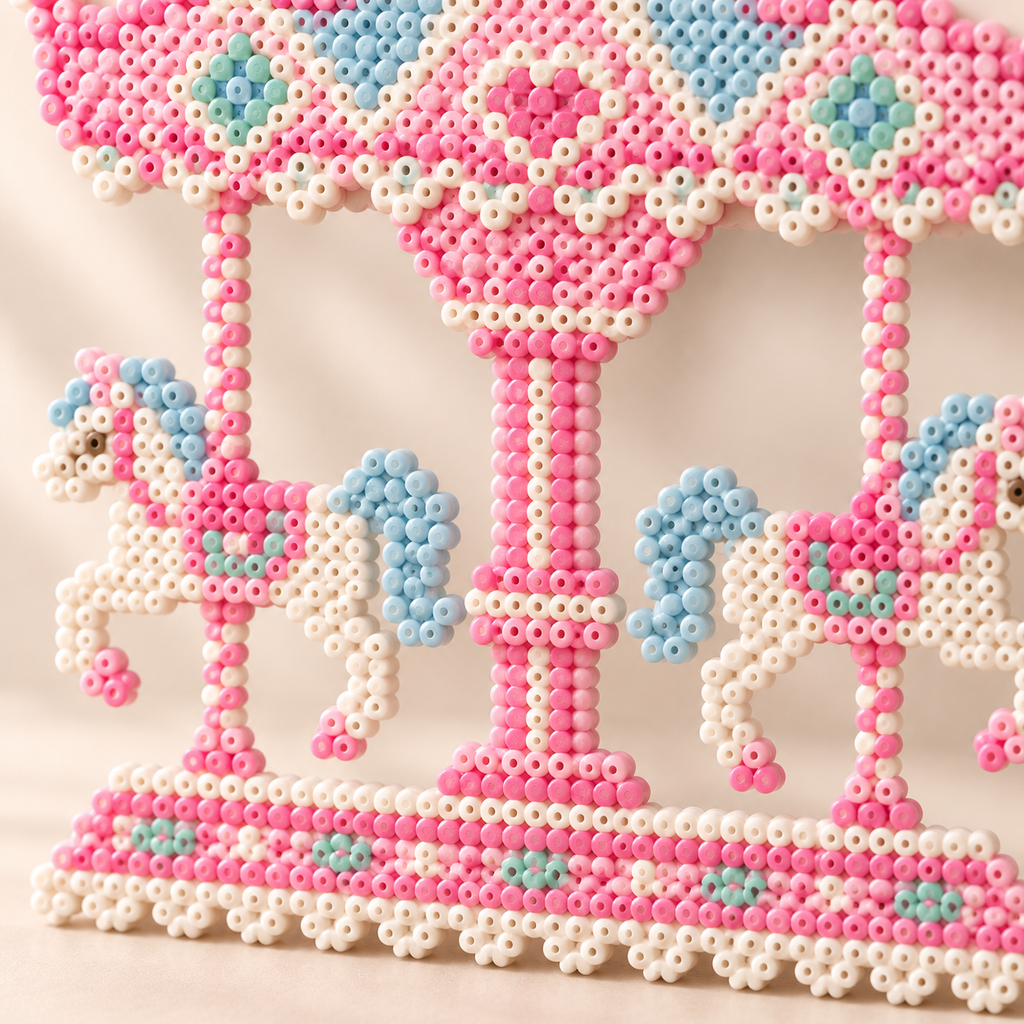 Close-up of the ivory horses and pastel details in the adapted carousel mini-bead artwork.