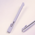 Close-up views of the lavender press-style bead placement pen