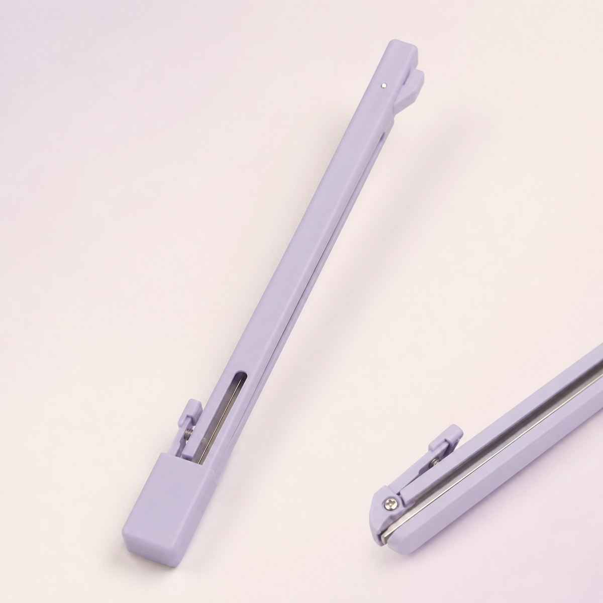 Close-up views of the lavender press-style bead placement pen