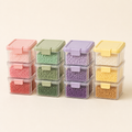 Twelve clear stackable mini bins for fuse bead storage